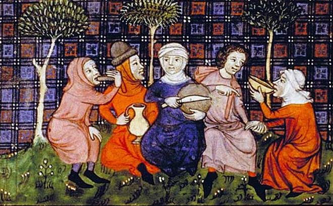 Grupa ubogich podróżnych spożywa chleb i wino. Czego jak czego, ale zboża w końcówce średniowiecza rzadko brakowało (źródło: domena publiczna).