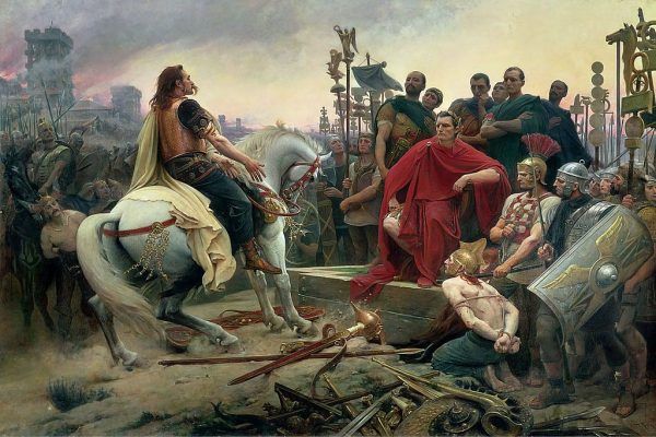 Wojny prowadzone przez Cezara kosztowały życie setki tysięcy ludzi. Na ilustracji kapitulacja galijskiego wodza Wercyngetoryksa przed Cezarem pod Alezją na obrazie Lionel-Noël Royera (źródło: domena publiczna).