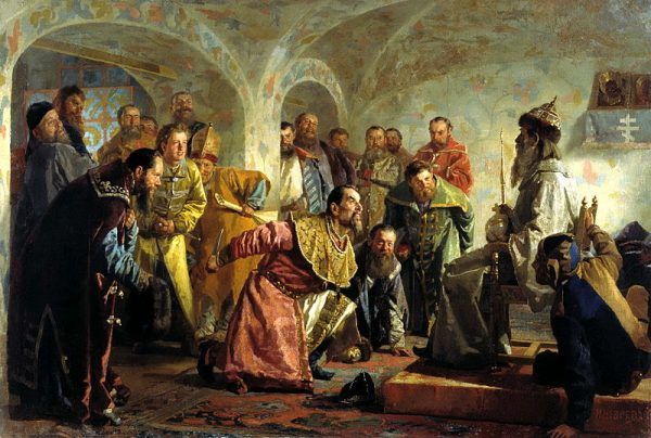 Iwan Groźny drwi z przywódcy bojarów Iwana Fiodorowa posadzonego na tronie w carskim przebraniu. Za chwilę Iwan zadźga nożem Fiodorowa. 